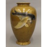 A Japanese bronze vase decorated with fish. 24 cm high.
