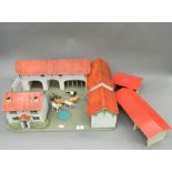 A wooden toy farmhouse,