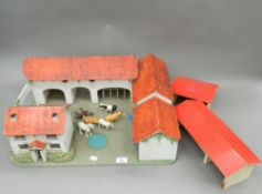 A wooden toy farmhouse,