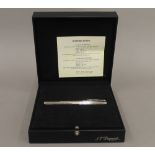A boxed Dupont diamond set palladium pen with 18 K white gold nib. 15 cm long.
