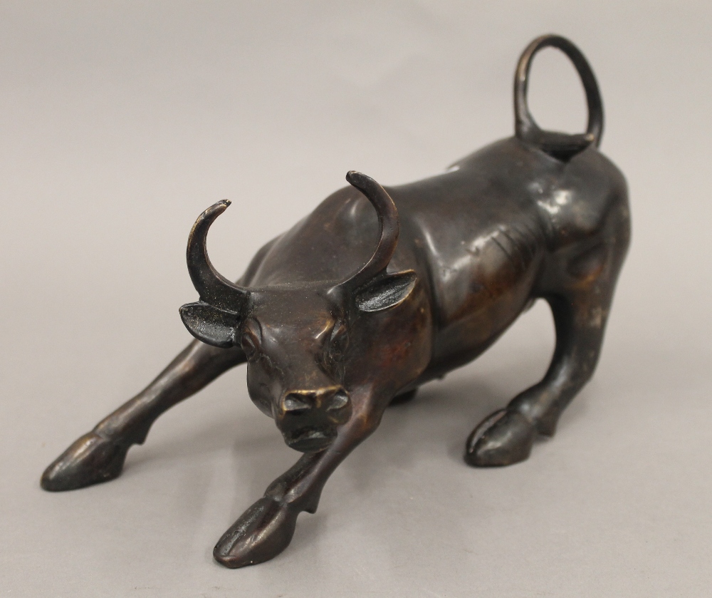 A bronze model of a bull. 30 cm long.