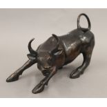 A bronze model of a bull. 30 cm long.