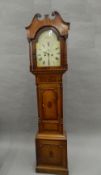 An early 19th century oak and mahogany eight-day longcase clock. 210 cm high.