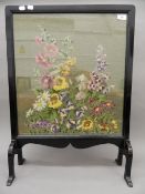 A tapestry fire screen