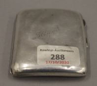 A WWI period silver cigarette case. 7 cm wide. 78.6 grammes.