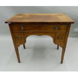 A 19th century mahogany lowboy. 86.5 cm wide.