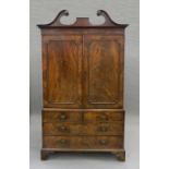 A 19th century mahogany linen press. 217 cm high x 125.5 cm wide.