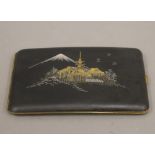 A Komi type Japanese cigarette case.