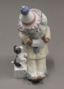 A small Lladro clown. 14 cm high.