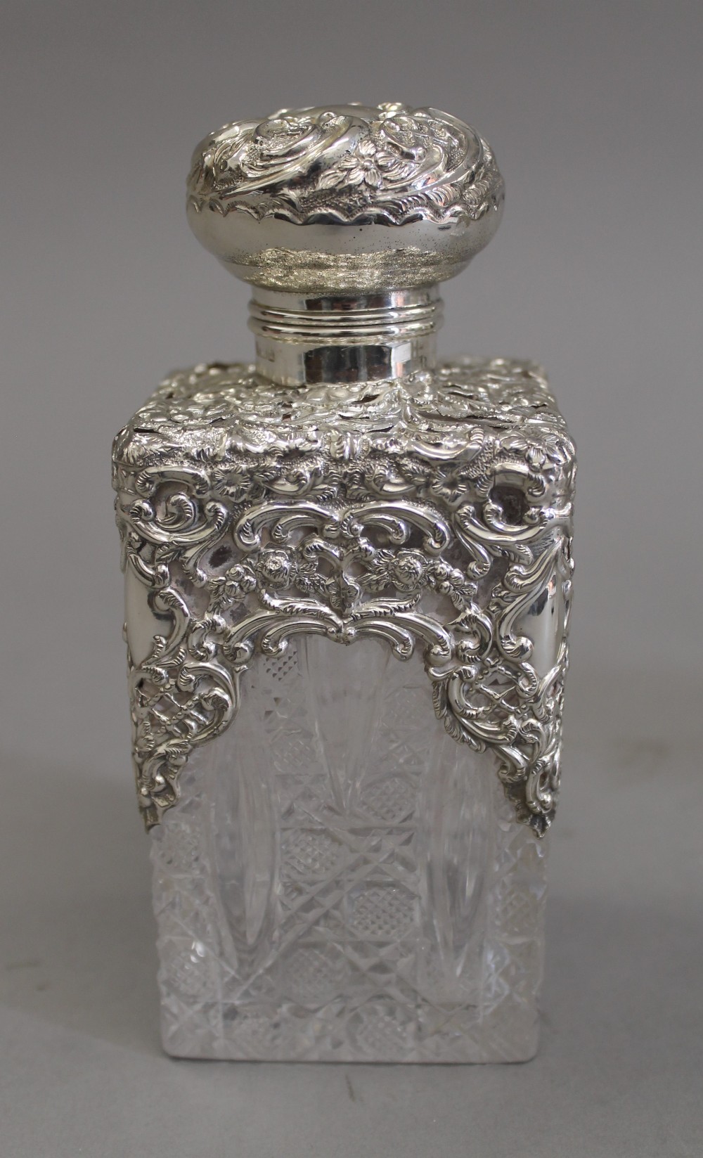 A pair of silver topped cut glass scent bottles. 14.5 cm high. - Image 2 of 9