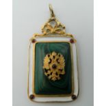 A silver and malachite pendant, bearing Russian marks. 6 cm high.