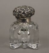 A silver topped cut glass inkwell. 8.5 cm high.