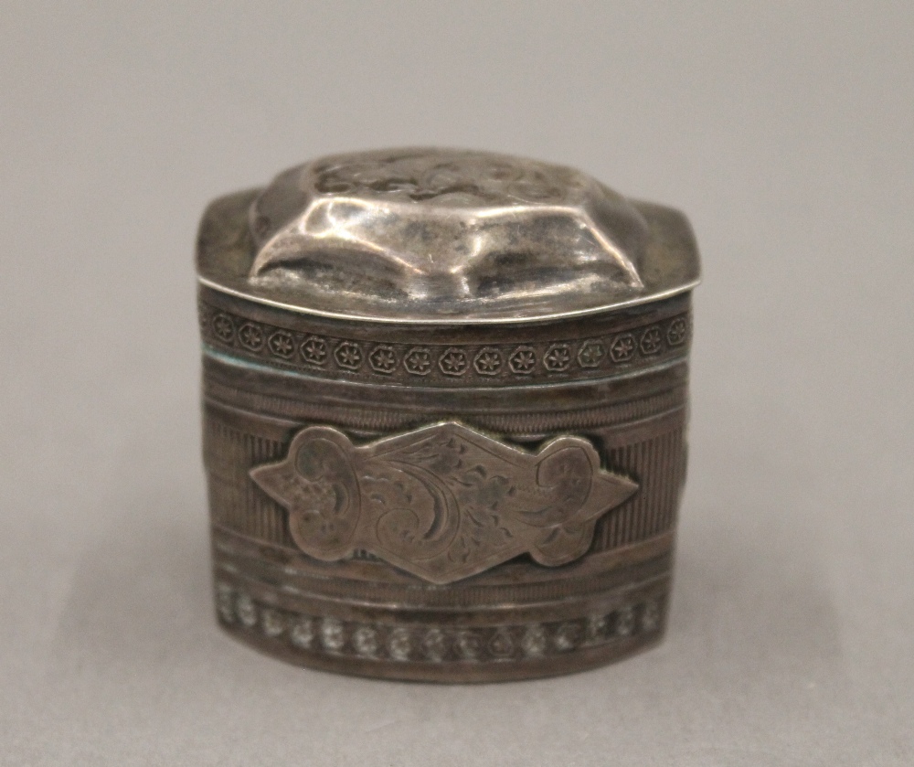 A small Dutch silver spice box. 4 cm high. 17.9 grammes.