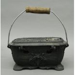 A cast iron carriage/foot warmer. 26 cm wide.