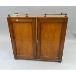 A 19th century mahogany side cupboard. 94 cm wide.