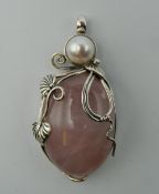 A silver rose quartz and pearl pendant. 6 cm high.