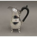 A silver bachelor's coffee pot, hallmarked London 1897. 16.5 cm high. 7.9 troy ounces total weight.