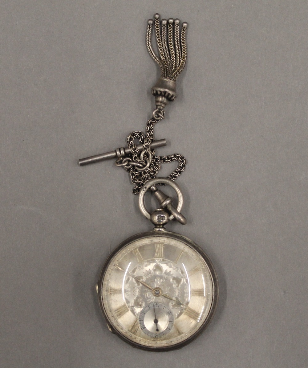 Two 19th century silver pocket watches on chains and a brass pocket watch case. - Image 9 of 12