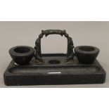 A Victorian bronze mounted marble desk stand. 27 cm wide.