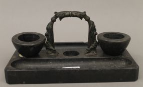 A Victorian bronze mounted marble desk stand. 27 cm wide.