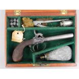 A 19th century boxed double barrelled percussion pistol