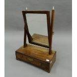 A 19th century mahogany toilet mirror. 38 cm wide.