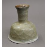 A Chinese celadon porcelain stem cup. 10.5 cm high.
