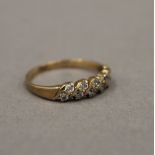 A 9 ct gold stone set ring. Ring size L/M.