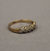 A 9 ct gold stone set ring. Ring size L/M.