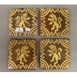 Four late 17th century slipware Flemish tiles. 15 cm wide.