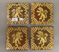 Four late 17th century slipware Flemish tiles. 15 cm wide.