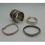 A small quantity of silver and other bracelets