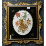 A framed embroidered floral panel. 49 x 54 cm overall.