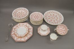 A quantity of Crown Derby and Wedgwood dinner wares