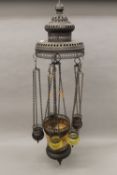 A Moroccan stained glass mounted hanging light. 94 cm high.