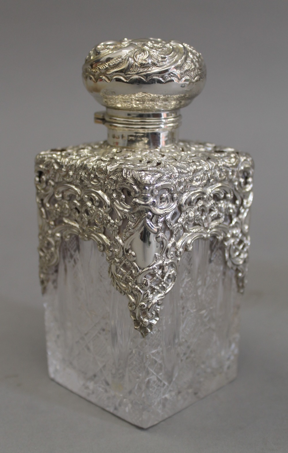 A pair of silver topped cut glass scent bottles. 14.5 cm high. - Image 3 of 9