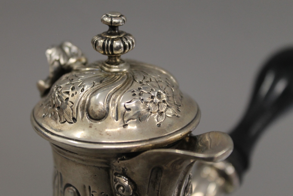A silver embossed chocolate pot. 21 cm high. 19.6 troy ounces total weight. - Image 6 of 8