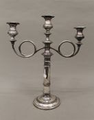 A silver plated candelabra. 44 cm high.