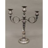 A silver plated candelabra. 44 cm high.