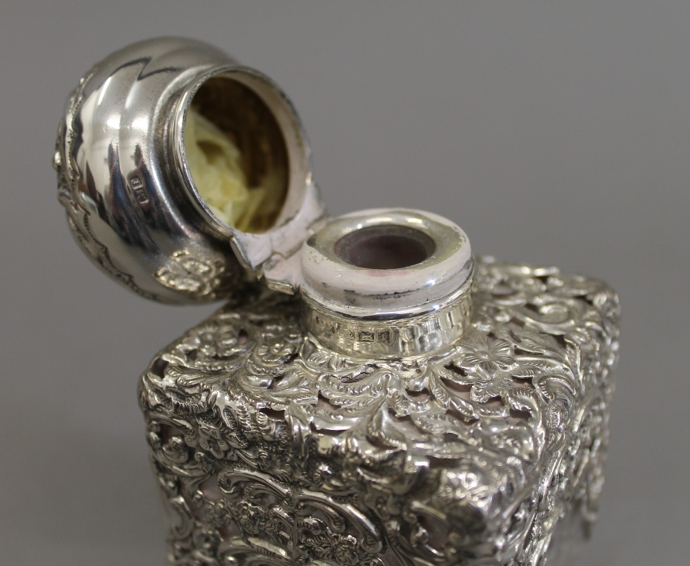 A pair of silver topped cut glass scent bottles. 14.5 cm high. - Image 9 of 9