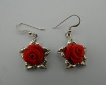 A pair of silver dress earrings. 2 cm wide.