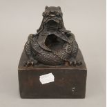 A bronze dragon seal. 15 cm high.