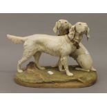 A Royal Dux porcelain model of two retrievers. 36 cm wide.