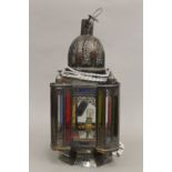 A stained glass hanging lantern. 54 cm high.