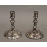 A pair of Christofle candlesticks. 16 cm high.