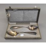 A pair of Continental silver serving spoons
