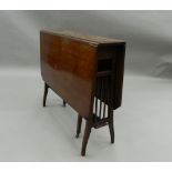 An Edwardian mahogany Sutherland table. 76 cm wide.