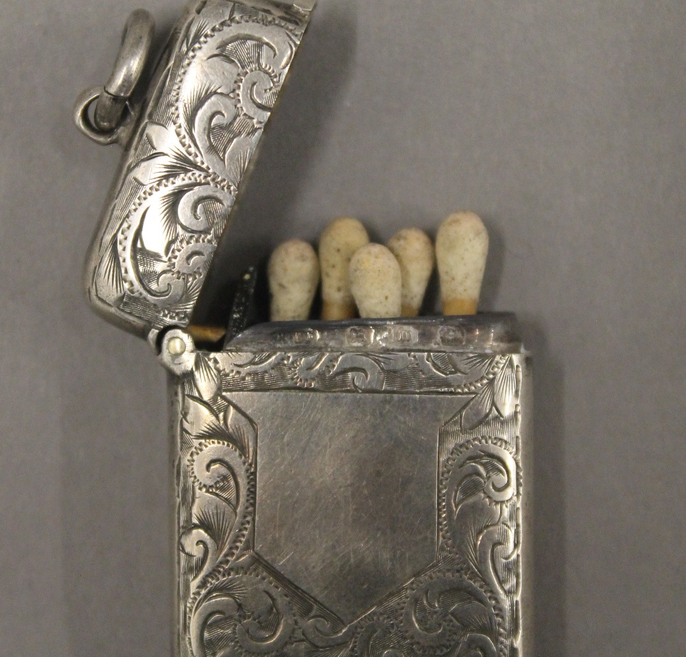 A silver vesta, another vesta and a novelty silver pepper. - Image 4 of 7