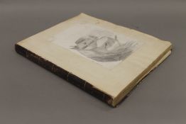 A Victorian album of pencil sketches and pen ink drawings. 26 cm wide.