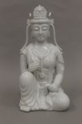 A large Chinese blanc de chine model of Guanyin. 36.5 cm high.